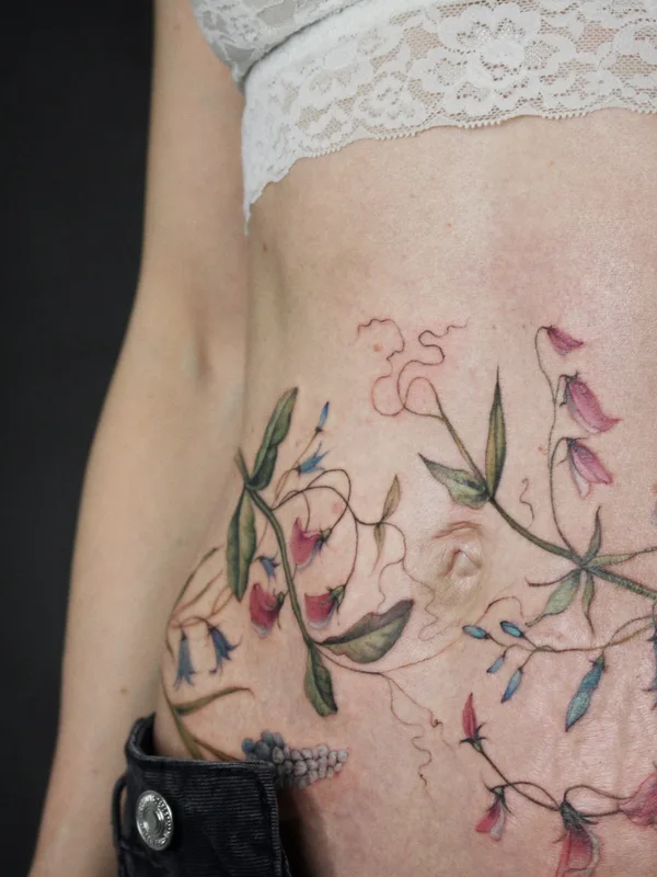 female color botanic tattoo on stomach #53608 | Tattoo Artist Елена Федченко