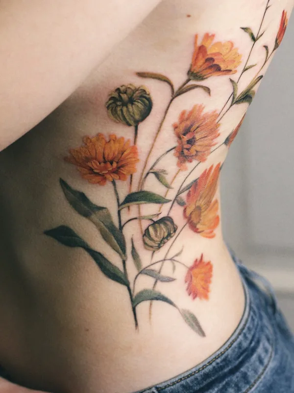 female color botanic tattoo on side #53606 | Tattoo Artist Елена Федченко
