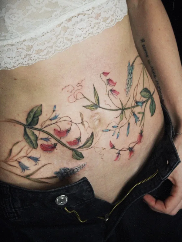 female color botanic tattoo on stomach #53607 | Tattoo Artist Елена Федченко