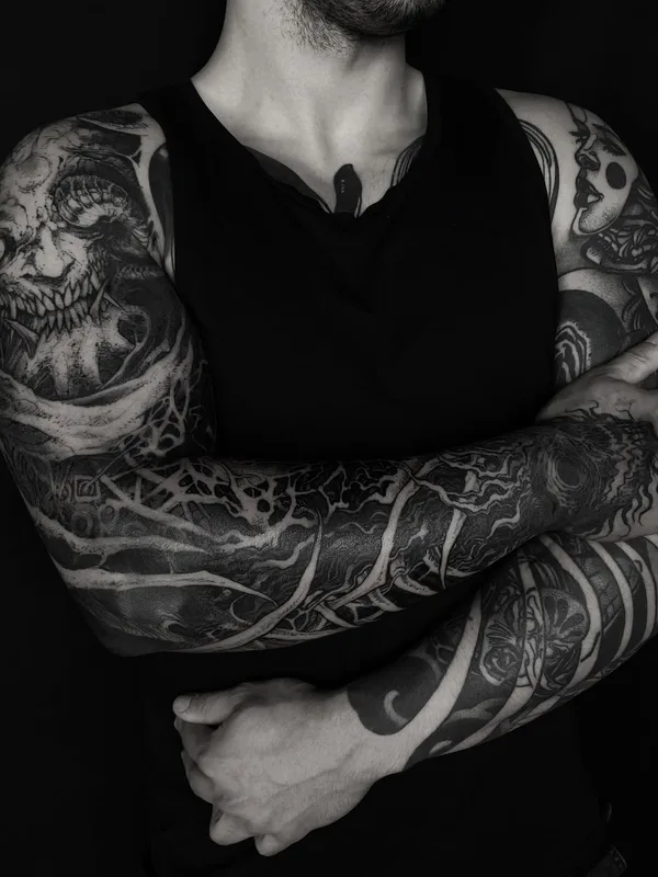 male black and grey blackwork tattoo on full sleeve #65859 | Tattoo Artist Rene Hilken