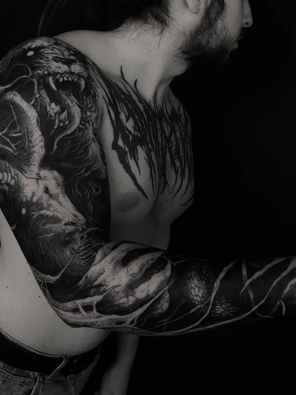 male black and grey blackwork tattoo on full sleeve #65860 | Tattoo Artist Rene Hilken