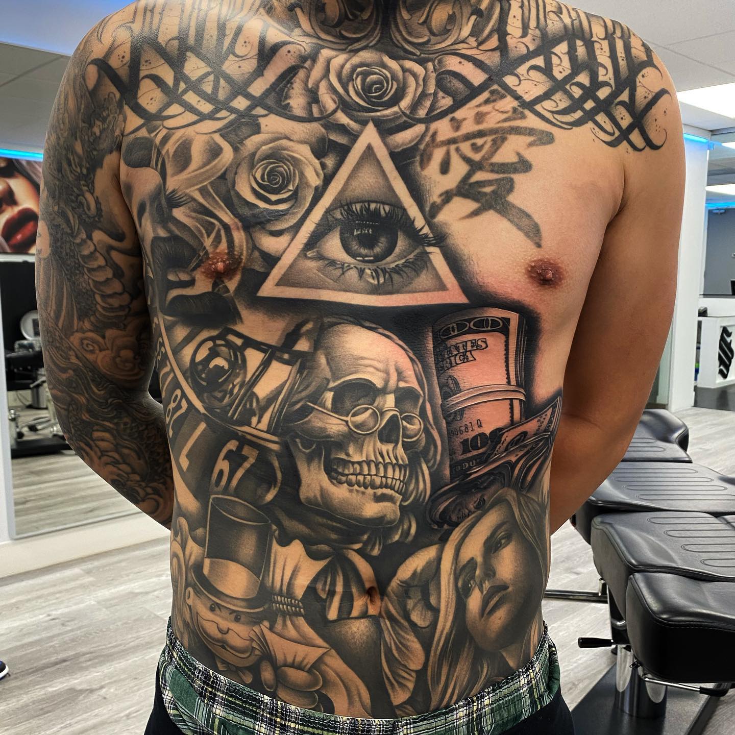 3D Skull With Guns Tattoo On Man Stomach By Joel Xian