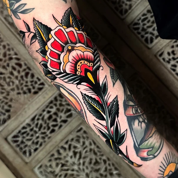 Traditional Flower, Feather tattoo on Forearm