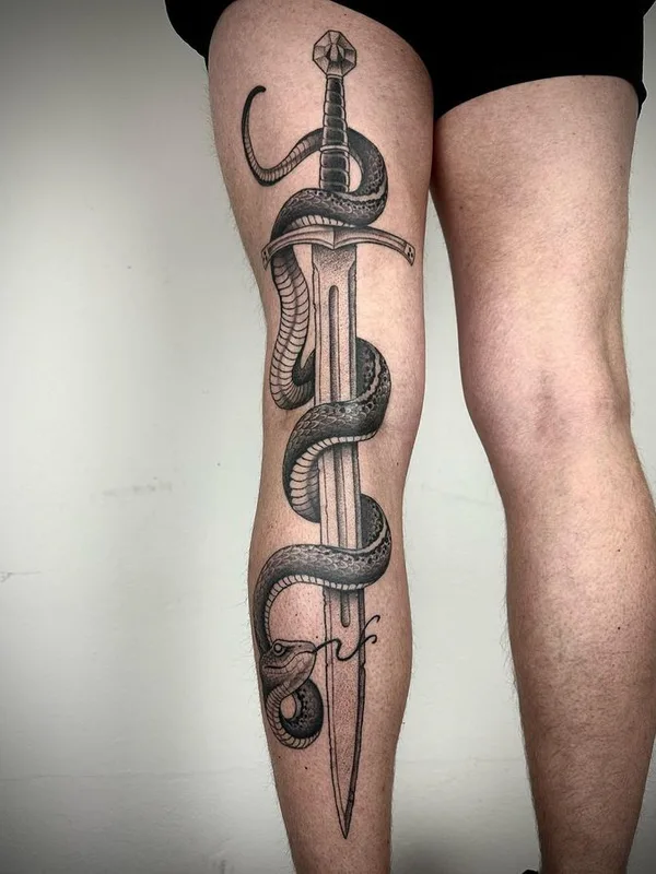 black and grey black and grey 纹身 在 thigh #66338 | 纹身师 Michael Joss