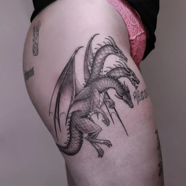 Black & Grey Dragon tattoo on Thigh