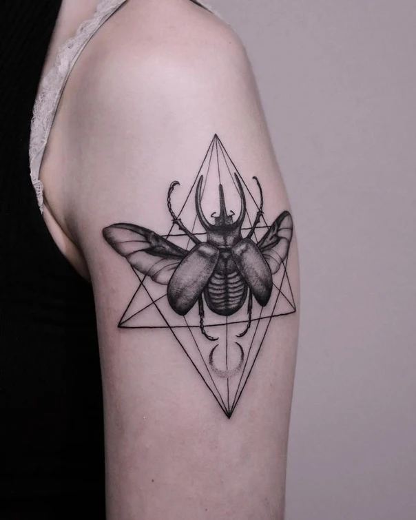 Blackwork Beetle, Geometric tattoo on Upper Arm