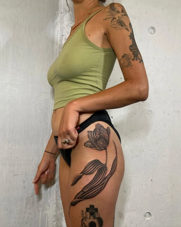 Blackwork Flower, Cross tattoo on Thigh