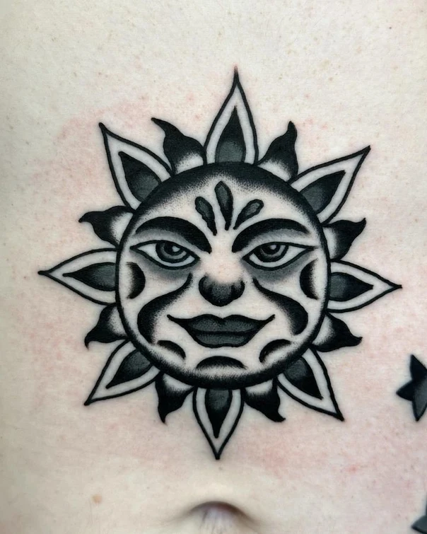 Traditional Sun tattoo on Sternum
