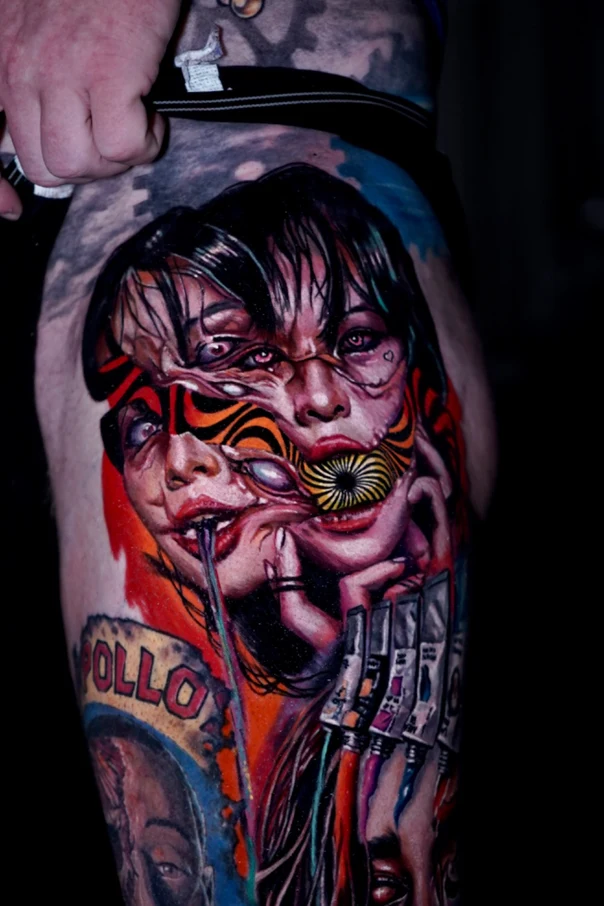 Surrealism Face, Abstract tattoo on Thigh