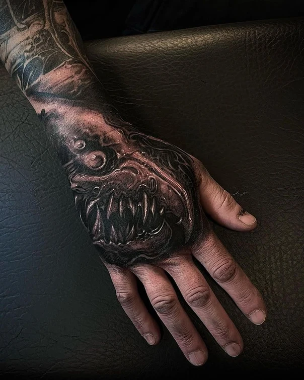 Biomechanical Monster, Teeth tattoo on Hand