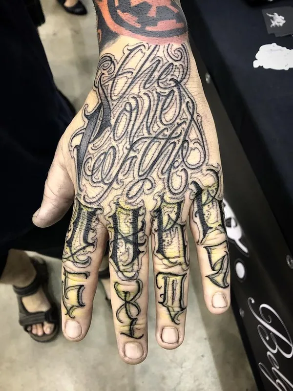 black and grey lettering 纹身 在 hand #66553 | 纹身师 AserOne