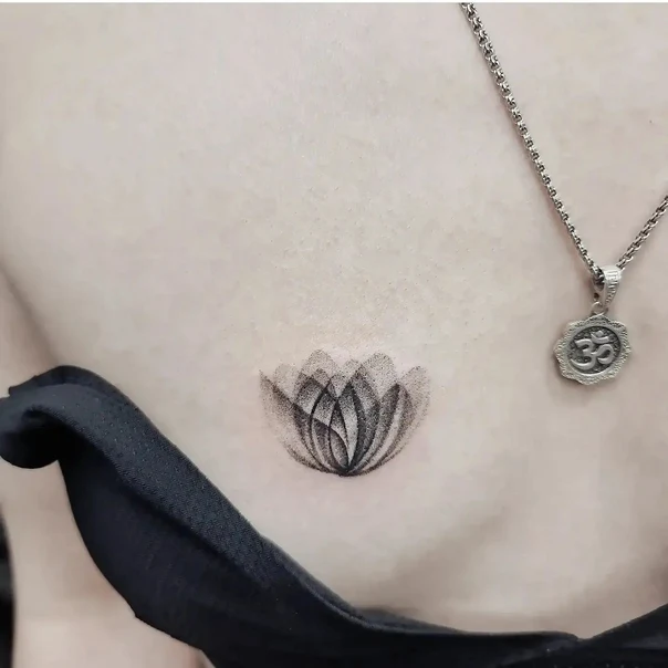 Dotwork Lotus tattoo on Sternum