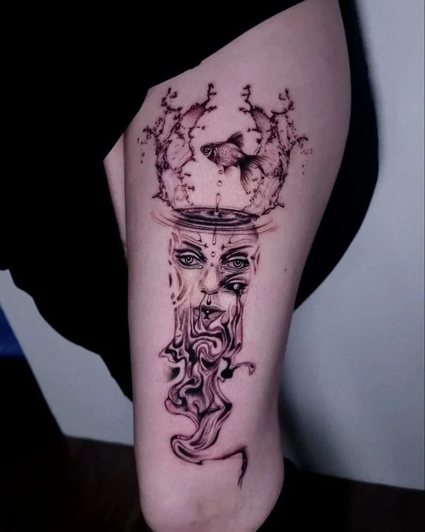 Surrealism Fish, Face tattoo on Thigh
