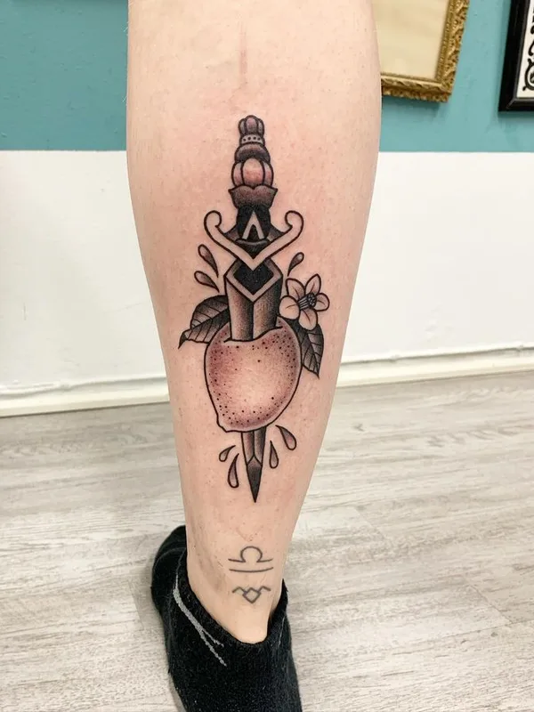 black and grey traditional tattoo on calf #66980 | Tattoo Artist Outi Vihlman