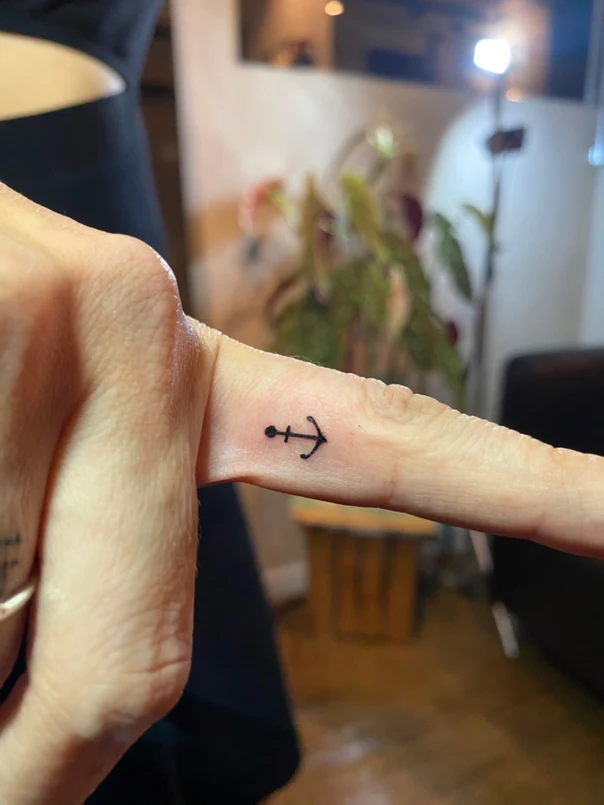 Linework Anchor tattoo on Finger