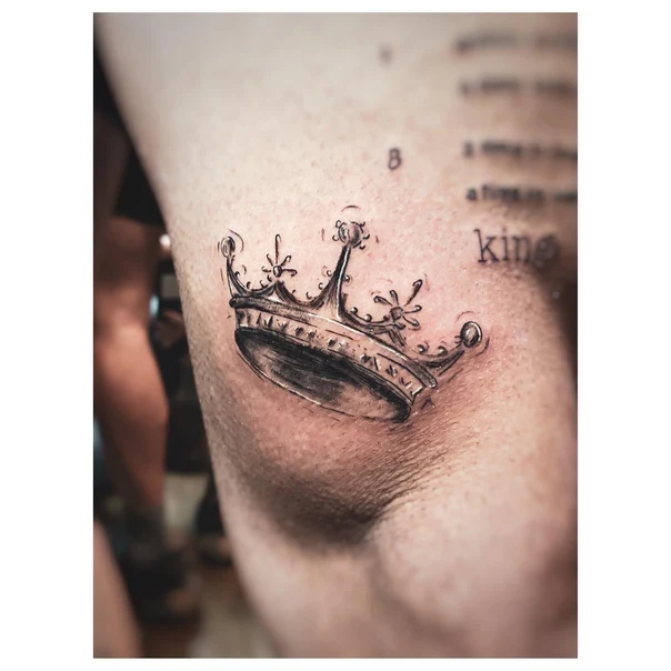 Black & Grey Crown tattoo on Upper Arm