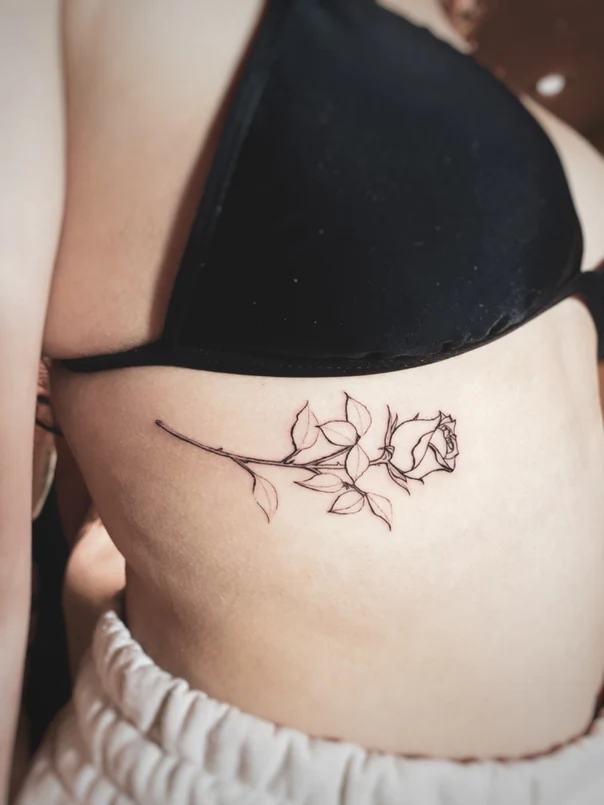 Fineline Rose, Leaves tattoo on Ribcage