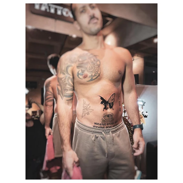 Blackwork Butterfly, Eye tattoo on Stomach