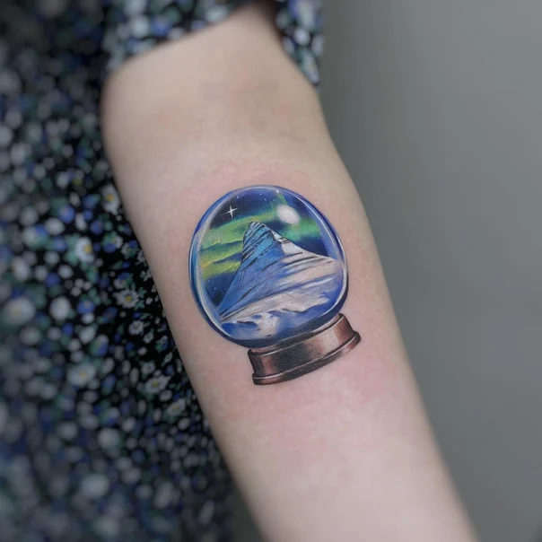 Realism Snow globe, Mountain tattoo on Forearm