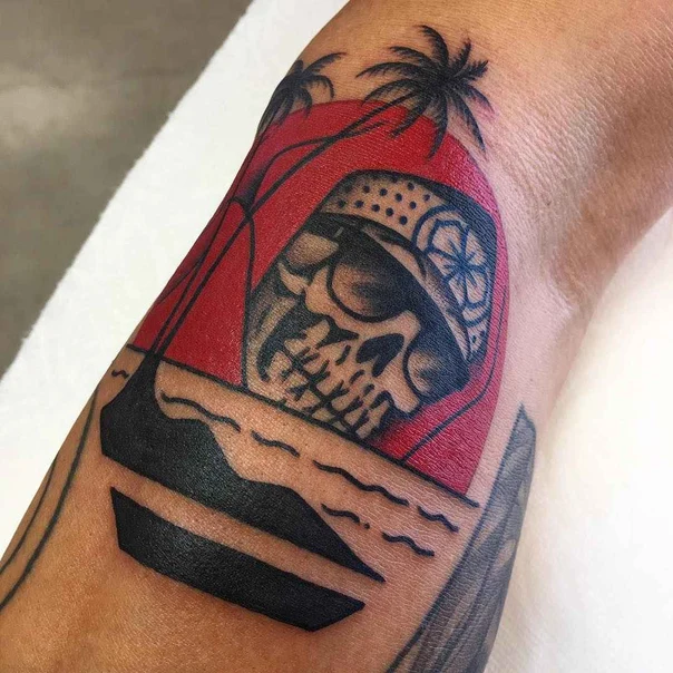 Traditional Skull, Palm trees tattoo on Forearm