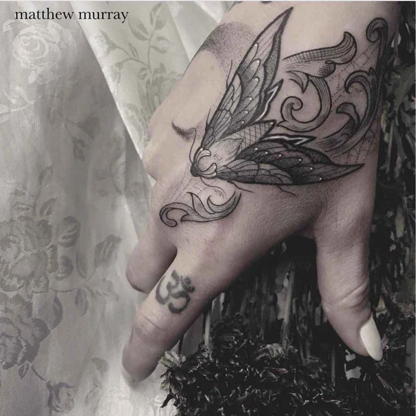 Black & Grey Wings, Ornamental tattoo on Hand