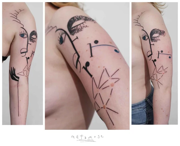 Abstract Face, Geometric tattoo on Upper Arm