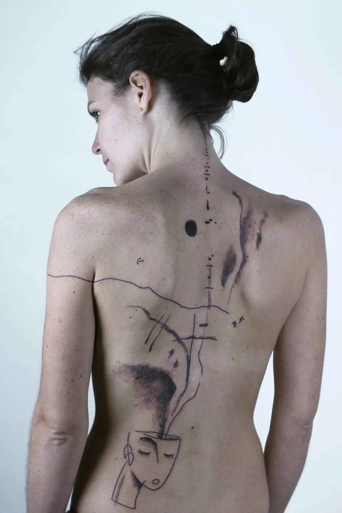 Tattoo artist Maison Métamose authors color and black abstract tattoo | Paris, France