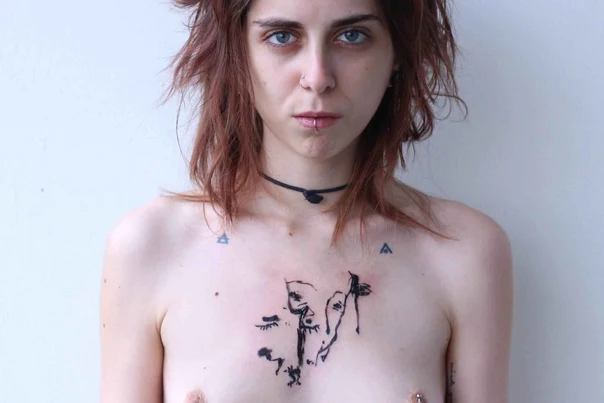 Sketch Face, Abstract tattoo on Chest