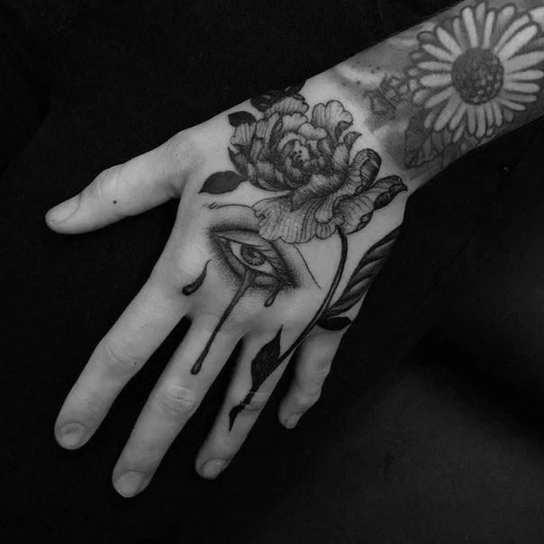 Black & Grey Eye, Flower tattoo on Hand