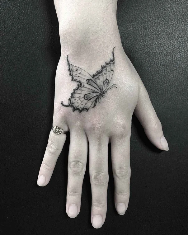 Fineline Butterfly tattoo on Back of Hand