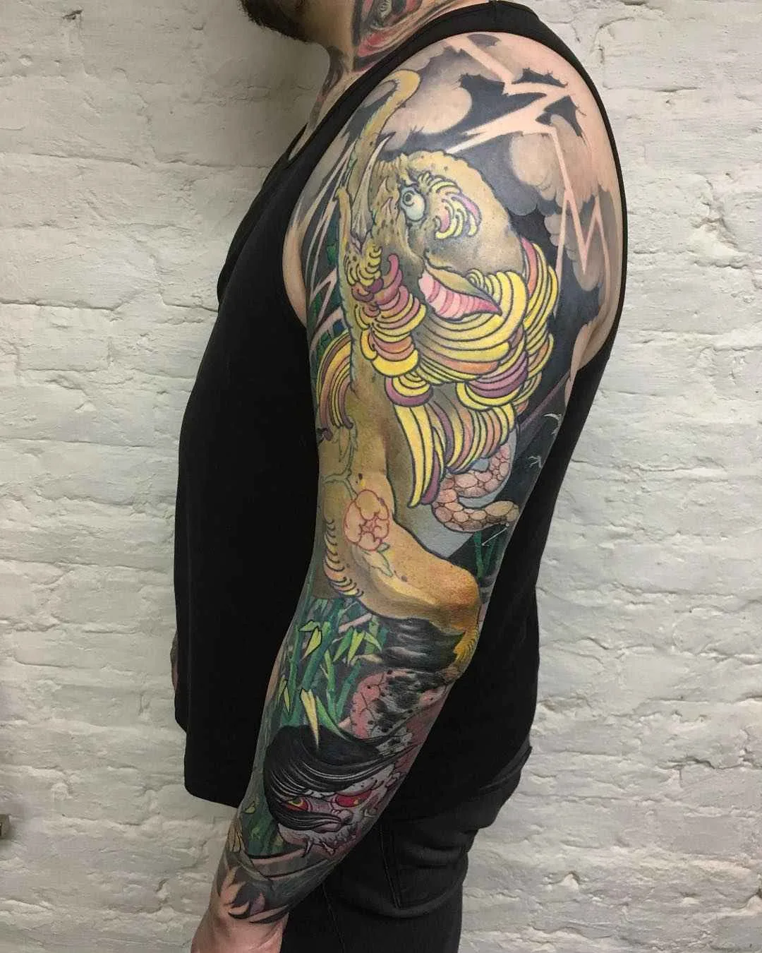 Artista de tatuagem Slava Fil Filitov, tatuagem colorida tradicional oriental japonesa | São Petersburgo, Rússia