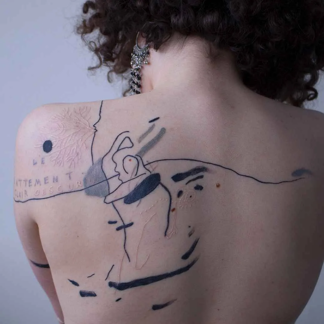 Tattoo artist Maison Métamose authors color and black abstract tattoo | Paris, France