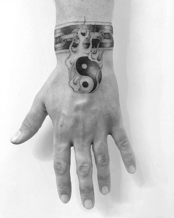 Blackwork Yin yang, Flames tattoo on Wrist