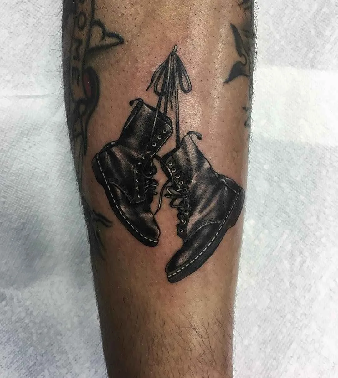Tattoo master and musician Dan Smith, authors realistic sneakers and shoes tattoo | USA, England, New Zealand