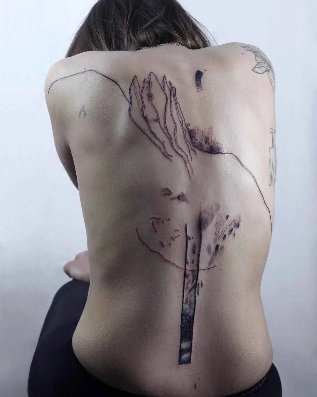 Tattoo artist Maison Métamose authors color and black abstract tattoo | Paris, France