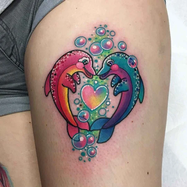 Cartoon Dolphin, Heart tattoo on Thigh