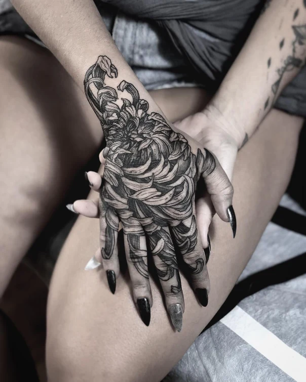 Blackwork Flower tattoo on Hand