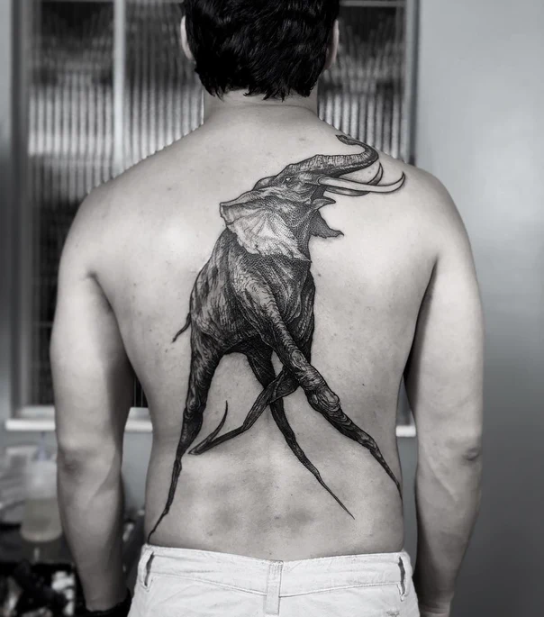 Sketch Elephant tattoo on Upper Back
