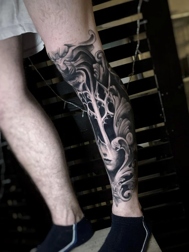 Black & Grey Face, Lion tattoo on Calf