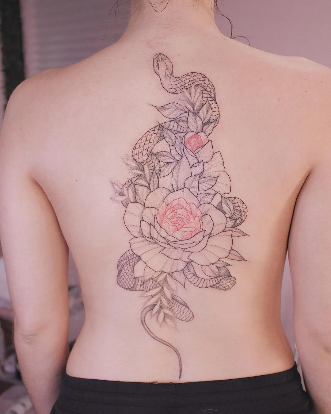 flower fineline tattoo on the back