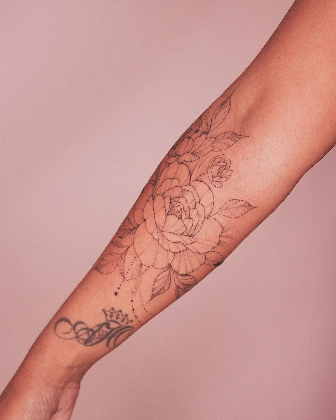 Peony tattoo on arm with thin line