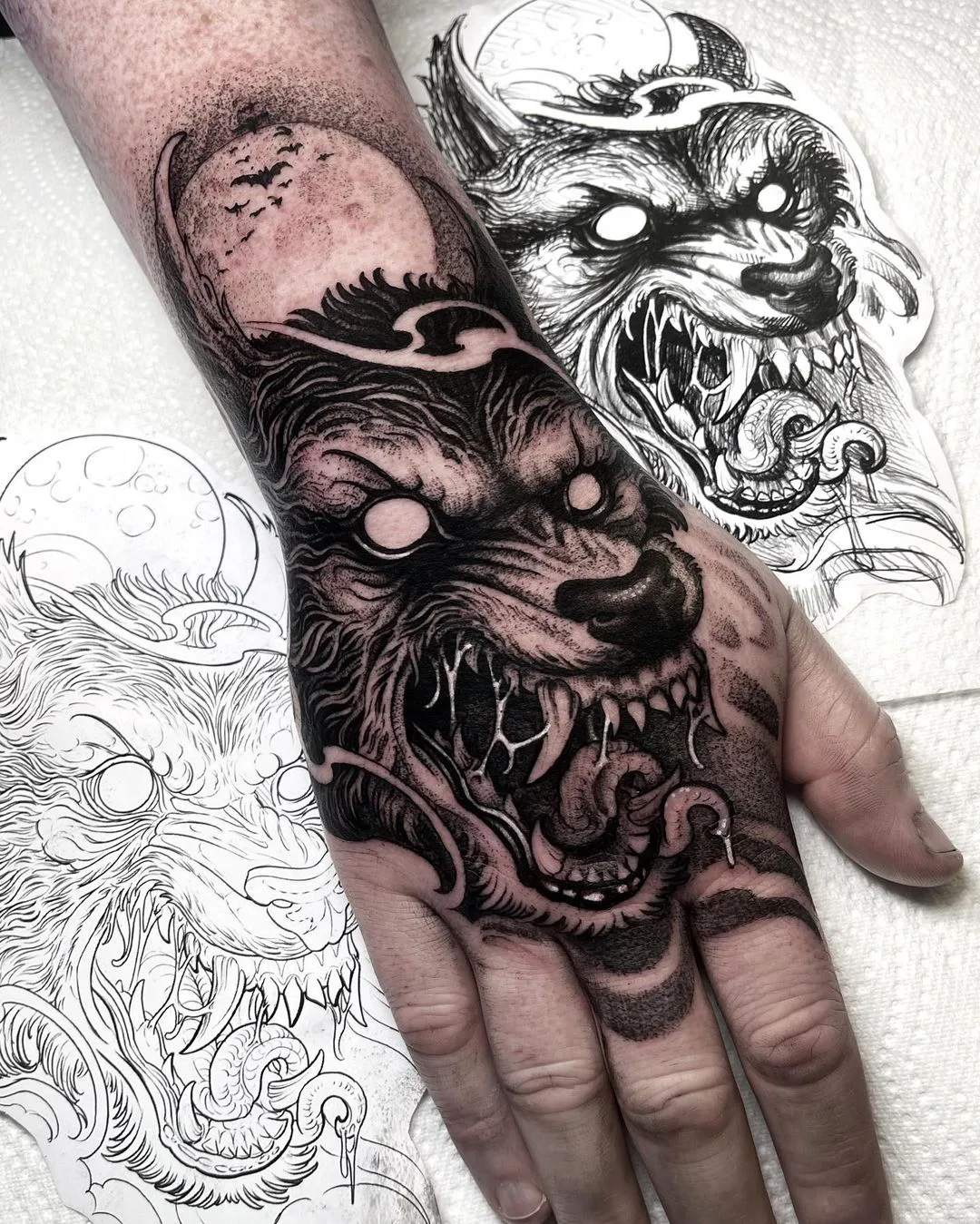 André Fantini hand tattoo blackwork