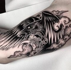 Black & Grey Raven, Clouds tattoo on Forearm