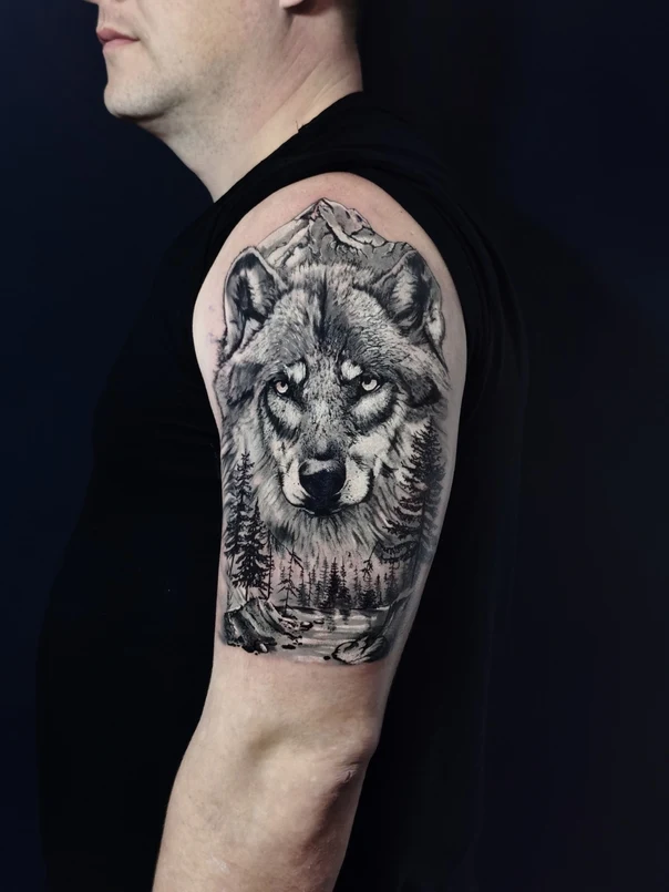 Realism Wolf, Mountain tattoo on Upper Arm