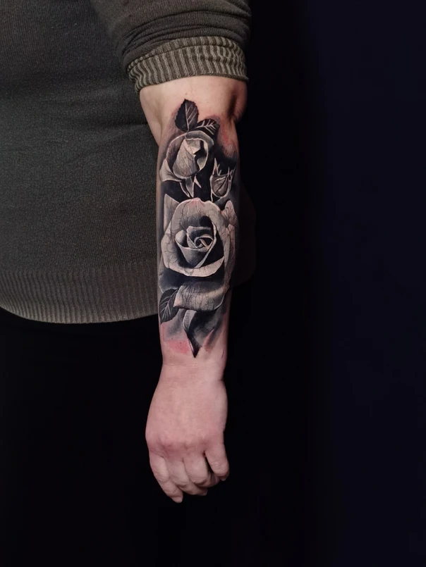 Realism Rose tattoo on Forearm