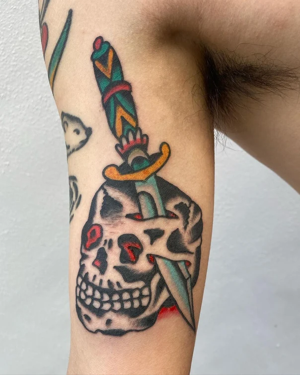 Traditional Skull, Dagger tattoo on Forearm