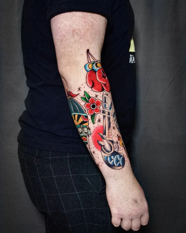 Traditional Boxing glove, Gun tattoo on Forearm