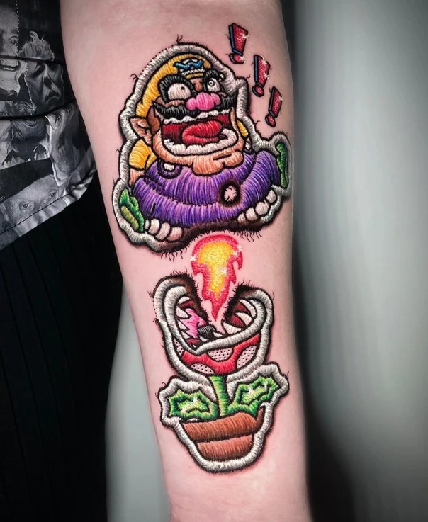 Illustrative Wario, Piranha plant tattoo on Forearm