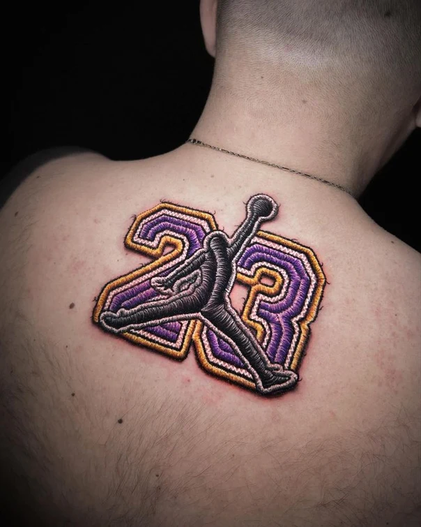 Illustrative Number, Figure tattoo on Upper Back