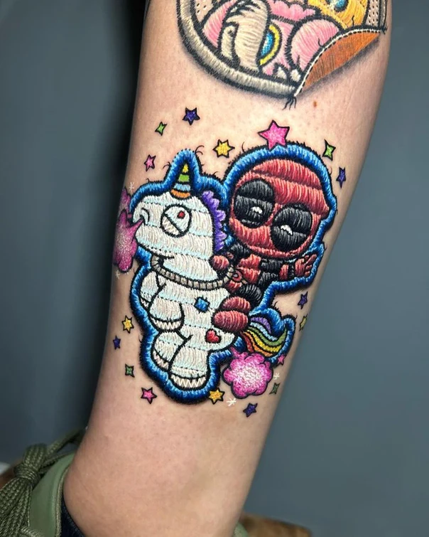 Cartoon Unicorn, Deadpool tattoo on Forearm
